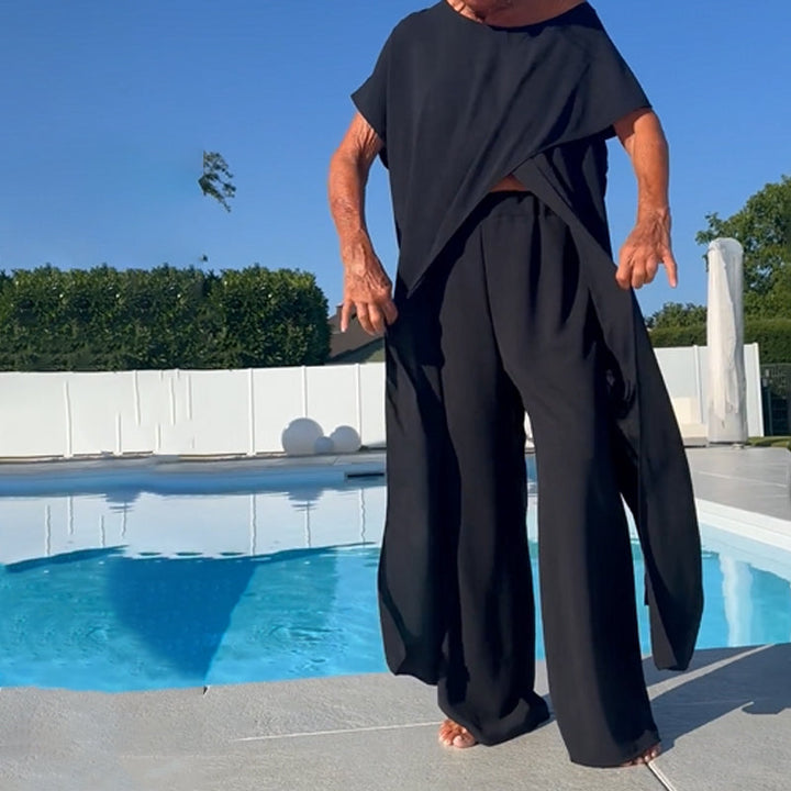 Top and trousers in solid color with off-the-shoulder design